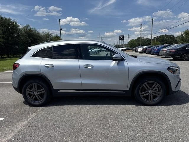 Driver-side profile of a silver Mercedes-Benz GLA at Mercedes-Benz of Fort Walton Beach
