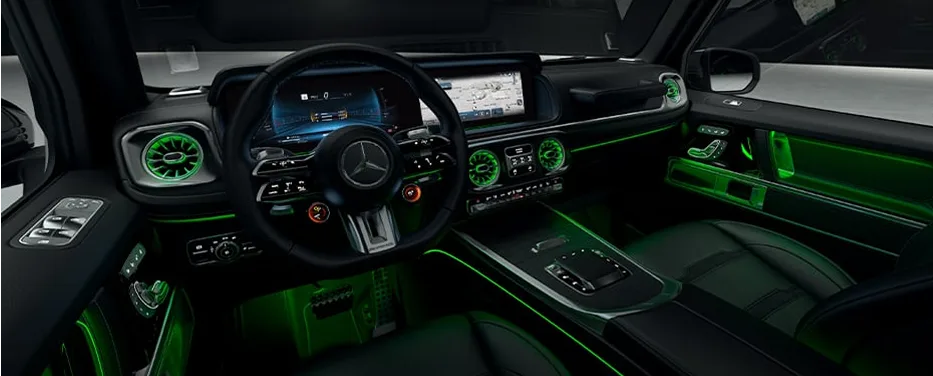 Green ambient-lit interior of the Mercedes-AMG G 63