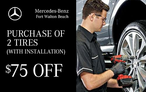 Purchase of 2 tires with installation, $75 off, with a Mercedes-Benz technician using an impact wrench on a wheel
